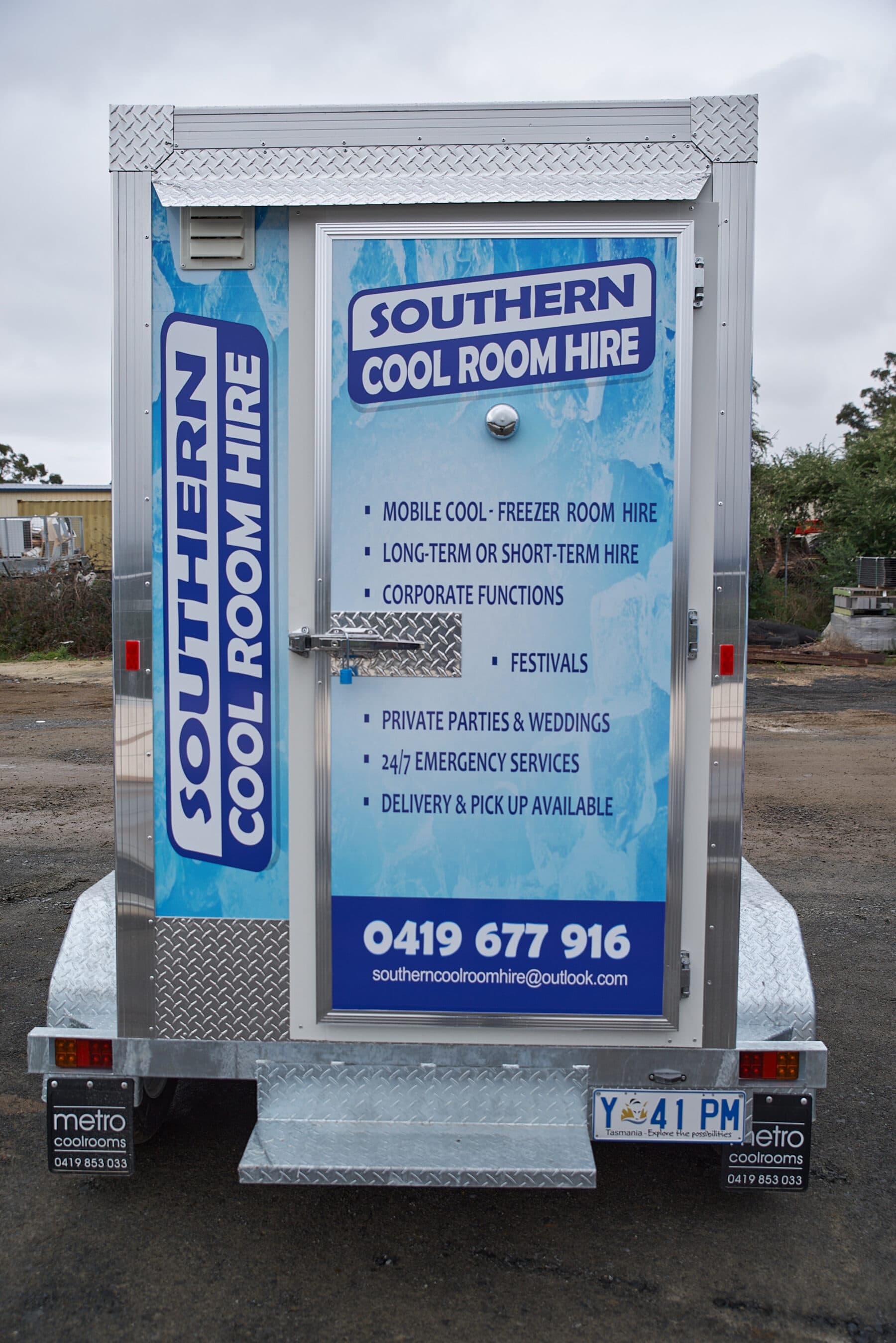 Rear of a Southern Cool Room Hire freezer trailer showing the door and signage